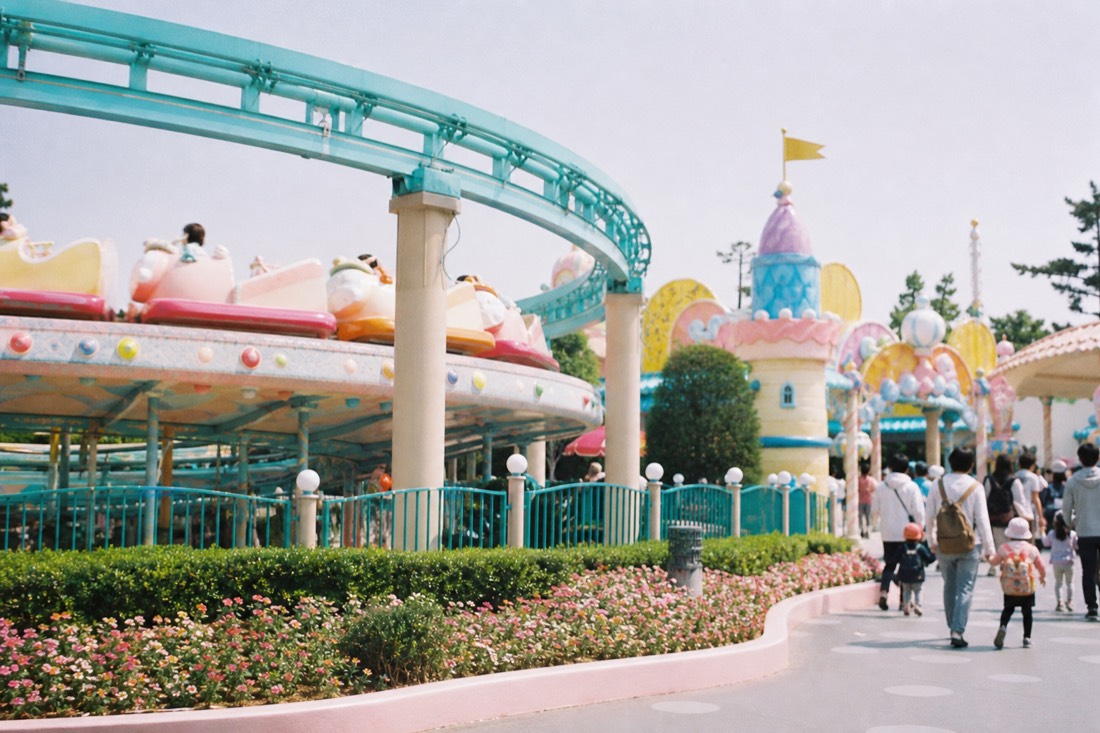 Bright new character-themed family area at a Japanese amusement park, like the 2026 San-X area