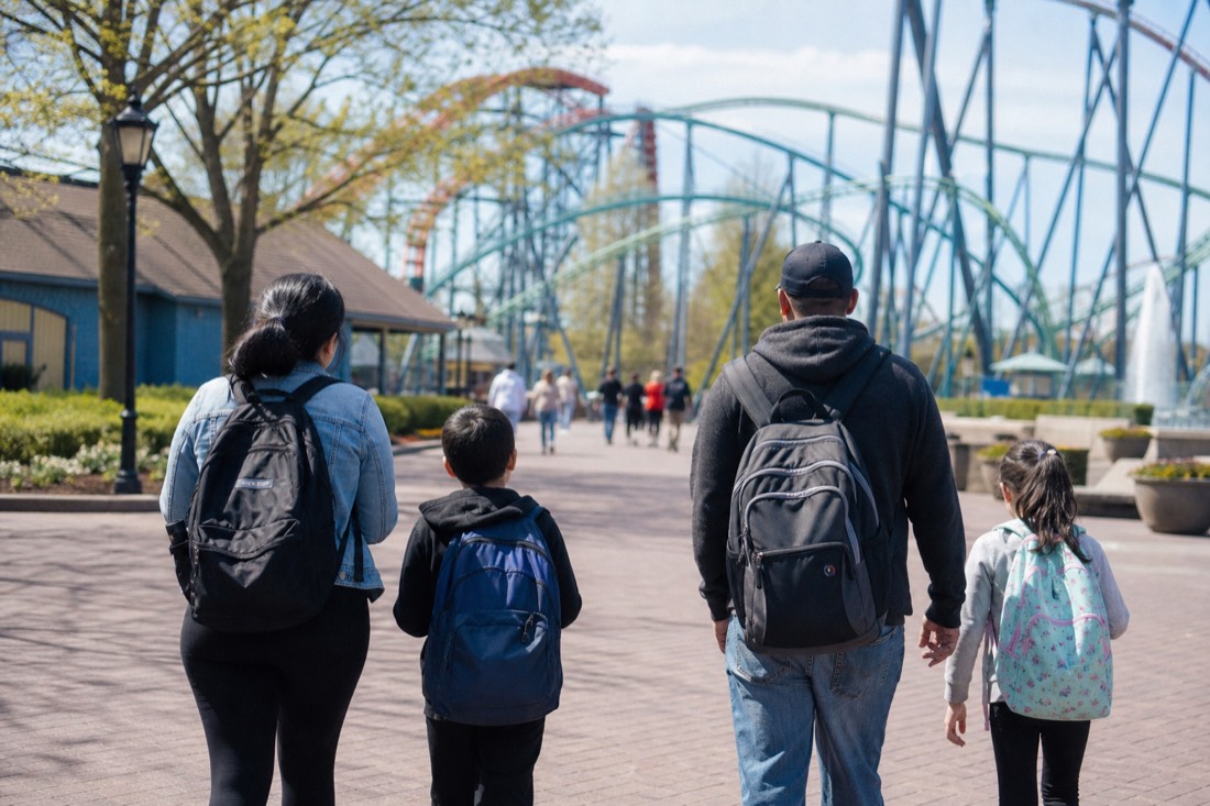 Family walking into a Japanese theme park plaza in the morning