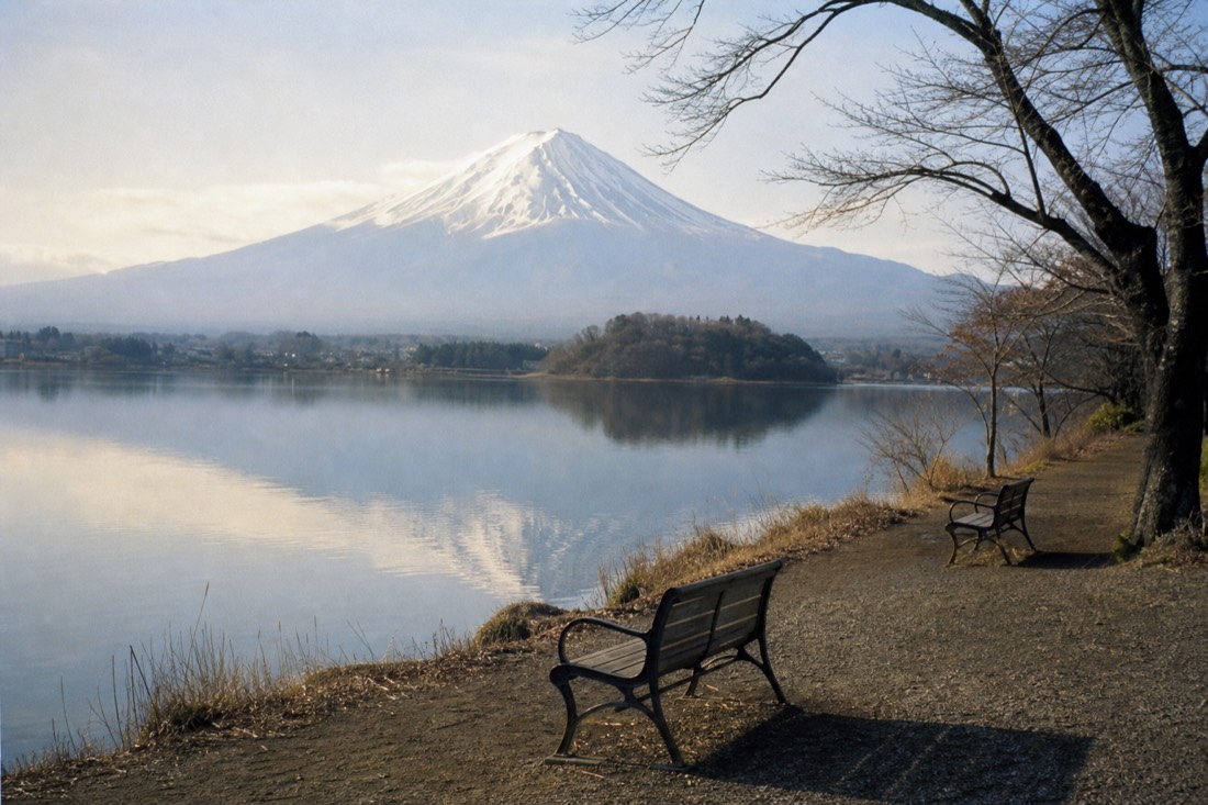 Quiet Lake Kawaguchiko shore path with Mount Fuji, a calmer alternative to the theme park